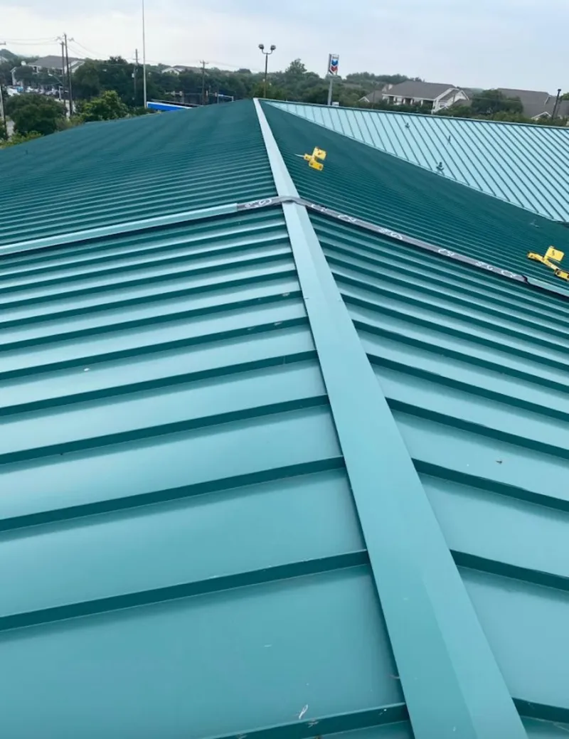 Green commercial metal roof ridge and valley for Metal Roof Repair in Pikesville